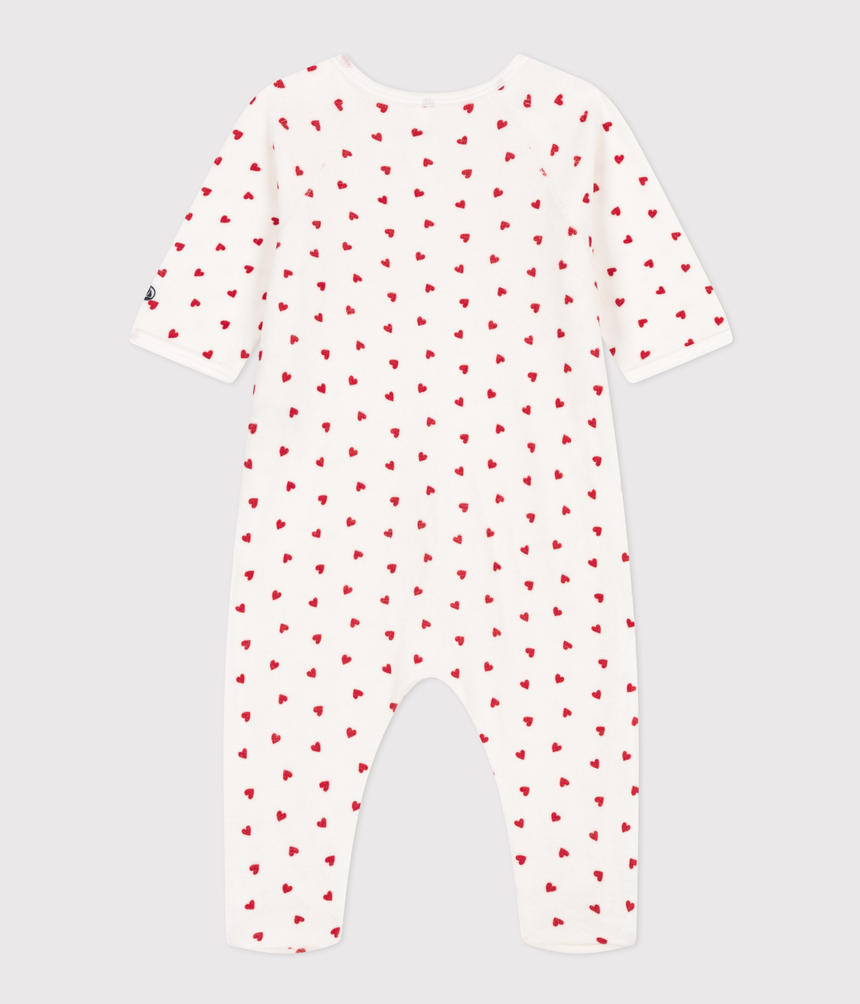 UNISEX BABY SLEEPSUIT IN VELOUR WITH A SMALL HEART PRINT