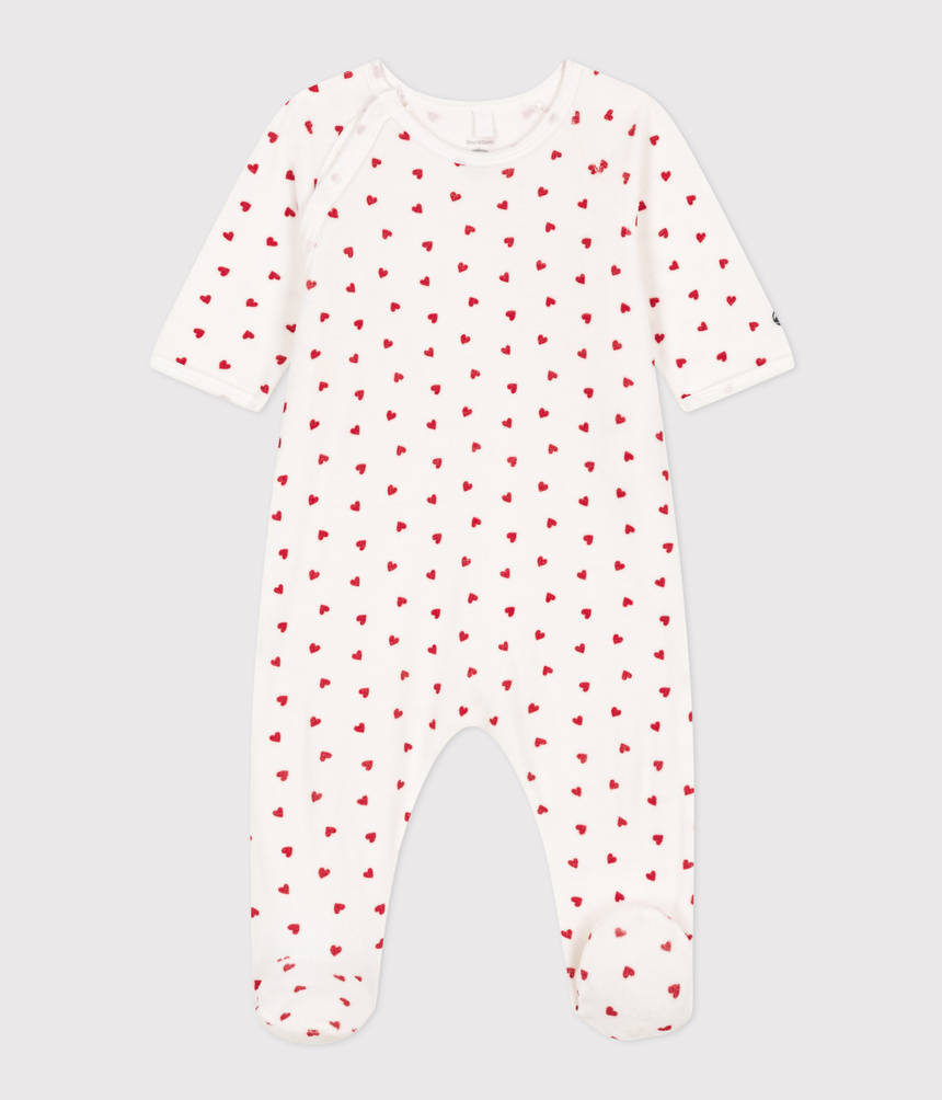 UNISEX BABY SLEEPSUIT IN VELOUR WITH A SMALL HEART PRINT