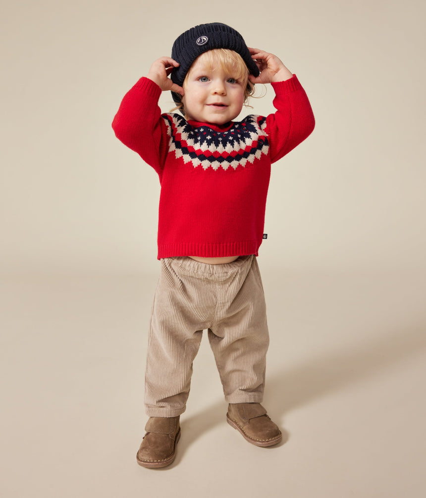 BABIES' KNITTED JUMPER CONTAINING WOOL