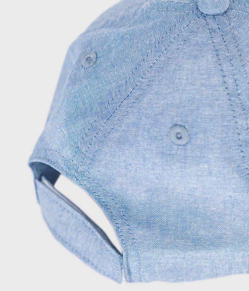 CHILDREN'S PETIT BATEAU CAP IN LIGHT-COLOURED DENIM