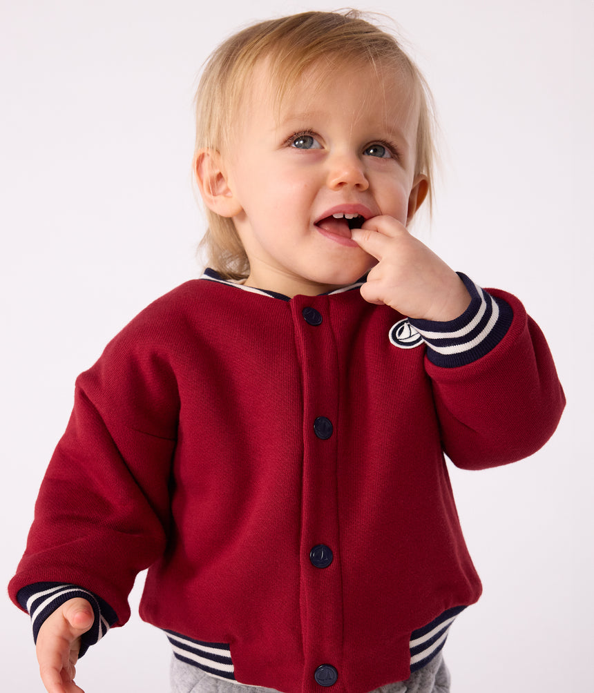 BABIES' VARSITY STYLE JACKET IN PLAIN COTTON AND SHERPA