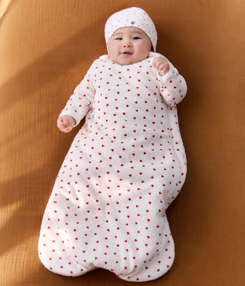 BABY SLEEPING BAG IN HEART-PRINT VELOUR, TOG 3