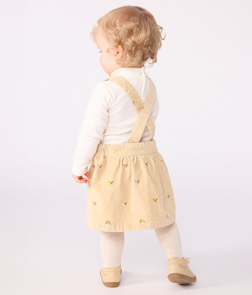 BABIES' CORDUROY DRESS EMBROIDERED WITH FLOWERS