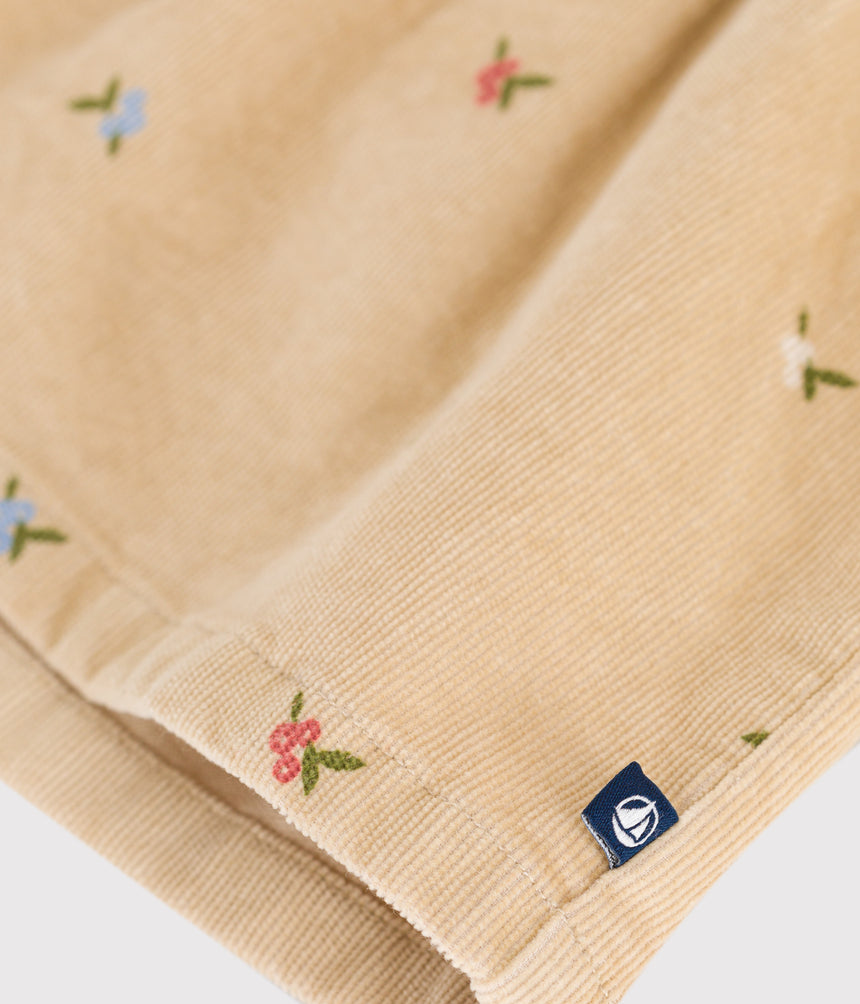 BABIES' CORDUROY DRESS EMBROIDERED WITH FLOWERS