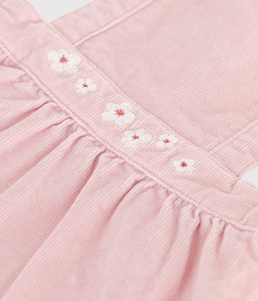 BABIES' DRESS IN CORDUROY EMBROIDERED WITH FLOWERS ON THE WAISTBAND