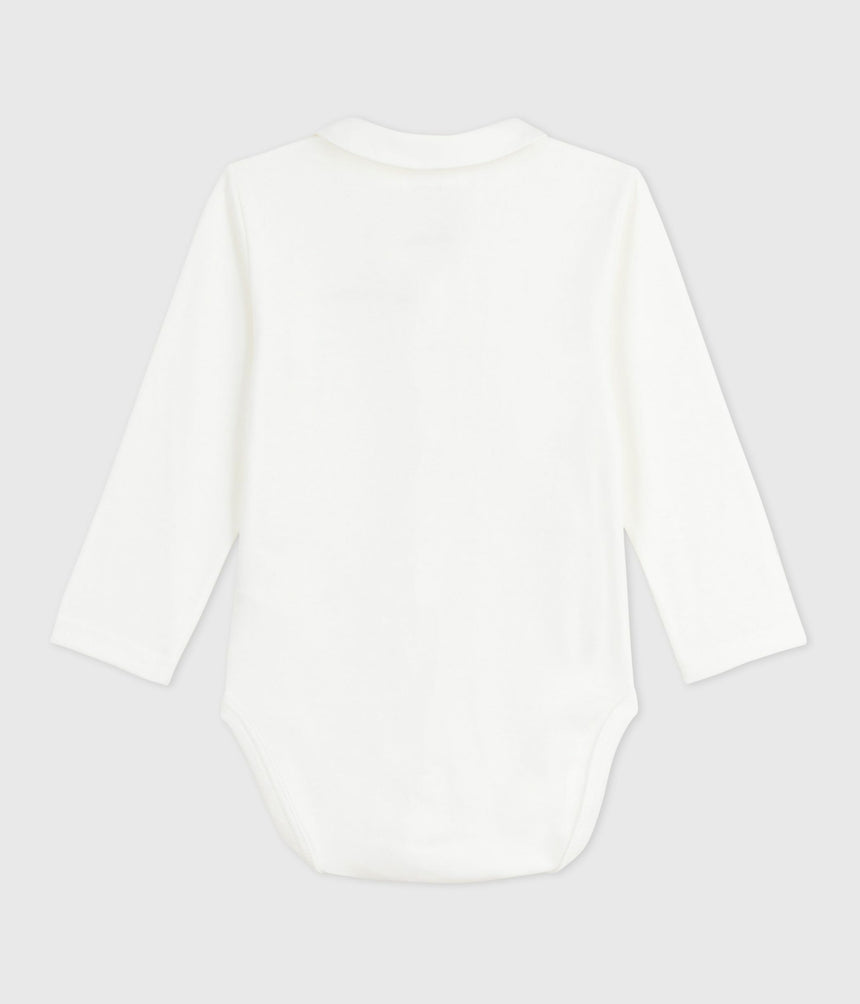 BABIES BODY WITH AN EMBROIDERED COLLAR AND A MESSAGE ON THE CHEST