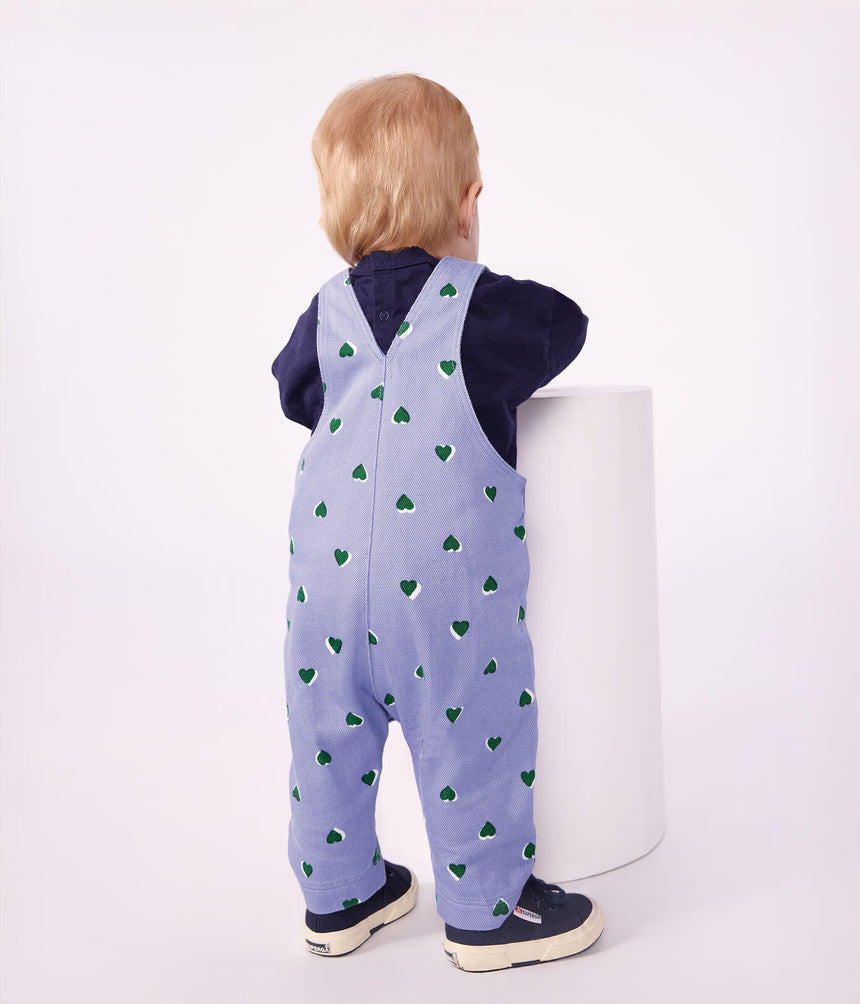 BABIES' DUNGAREES IN SERGE WITH LONG LEGS AND A HEART PRINT