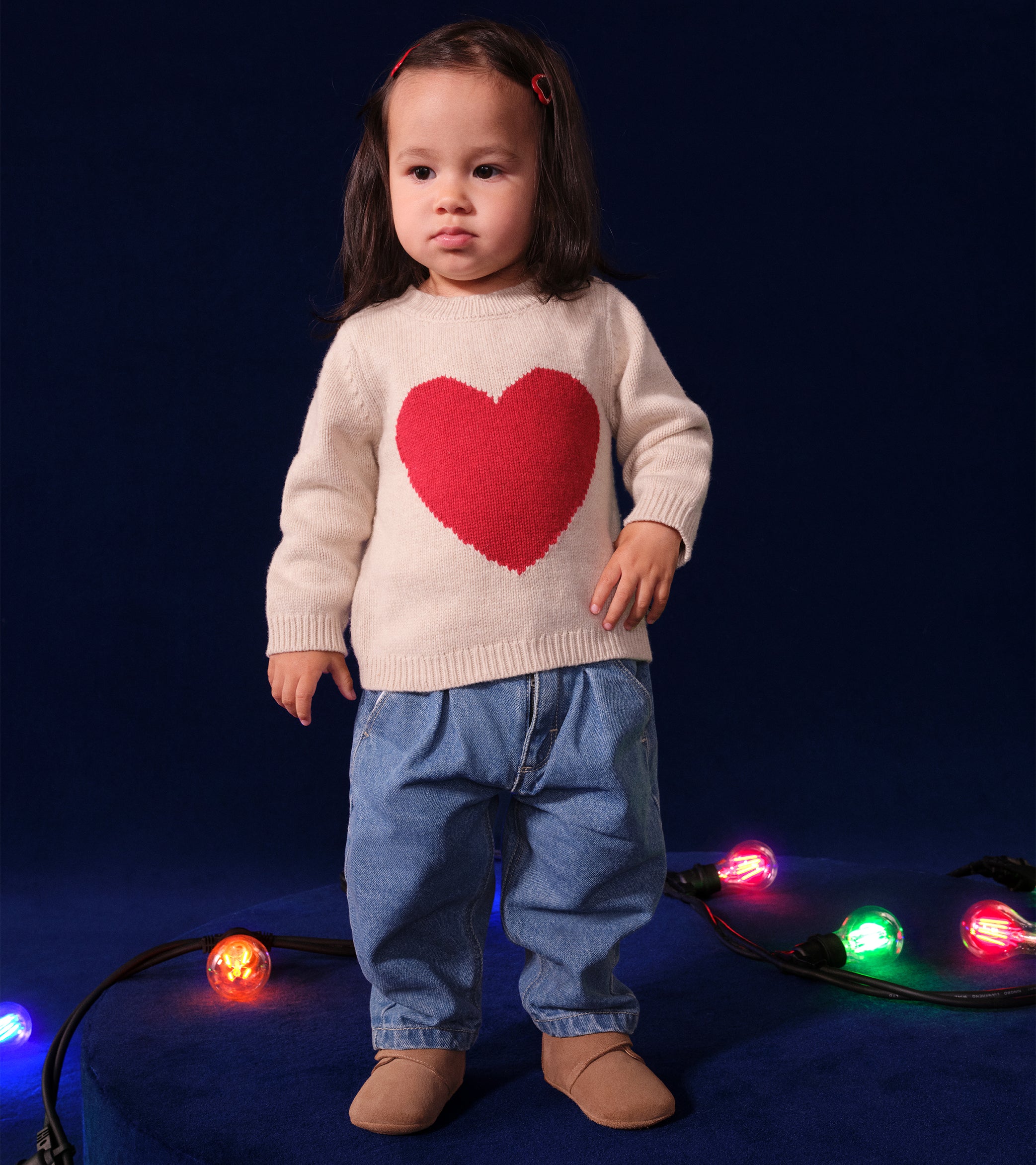 BABIES' KNITTED JUMPER CONTAINING WOOL