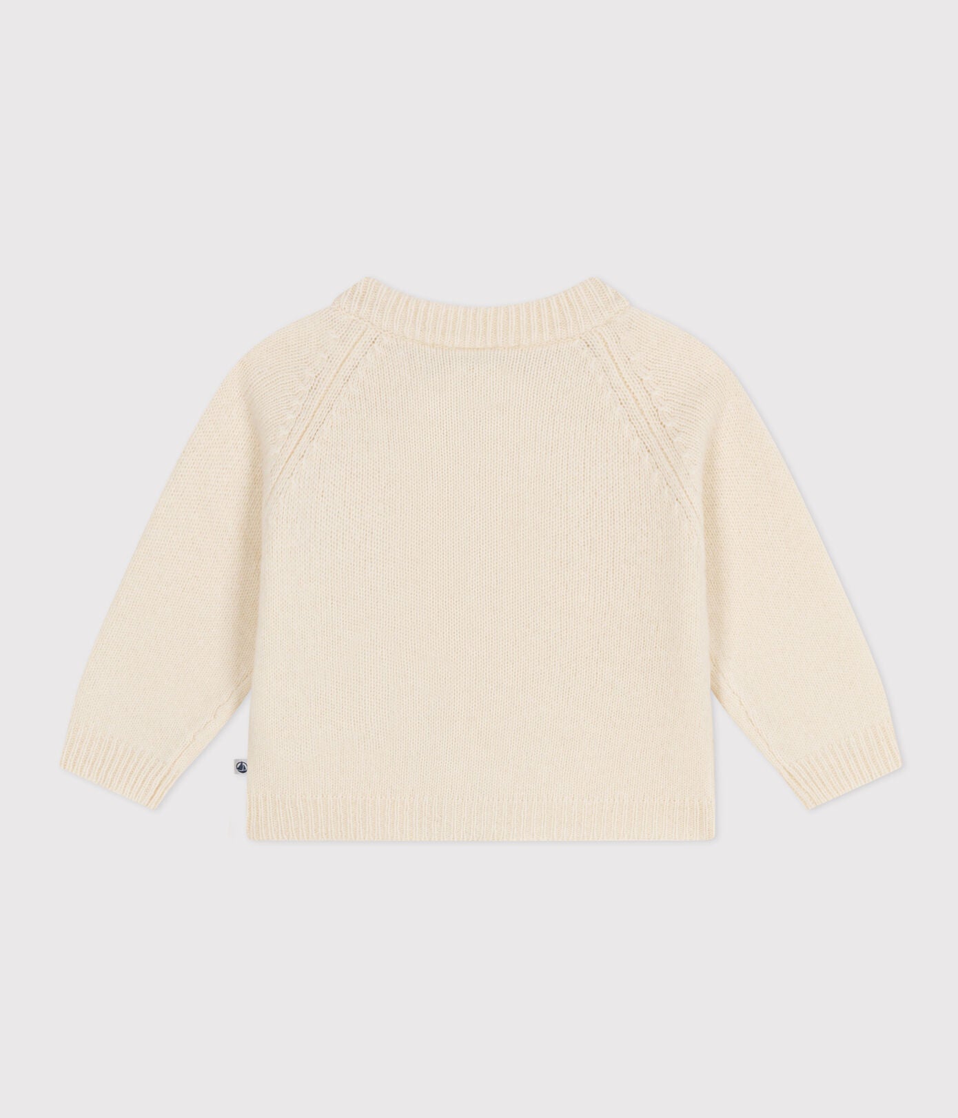 KNITTED CARDIGAN CONTAINING WOOL FOR BABIES. KNITTED CARDIGAN CONTAINING WOOL FOR BABIES.