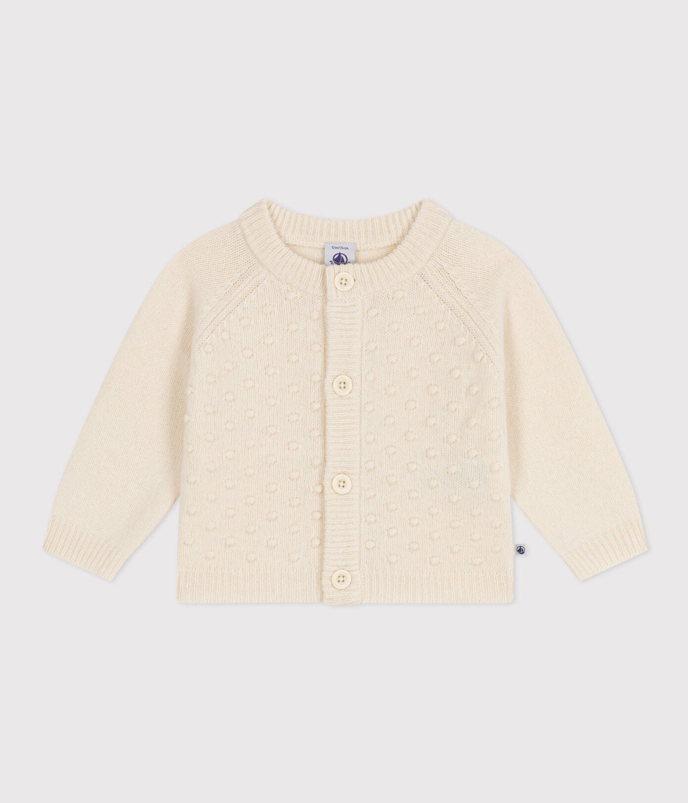 KNITTED CARDIGAN CONTAINING WOOL FOR BABIES. KNITTED CARDIGAN CONTAINING WOOL FOR BABIES.