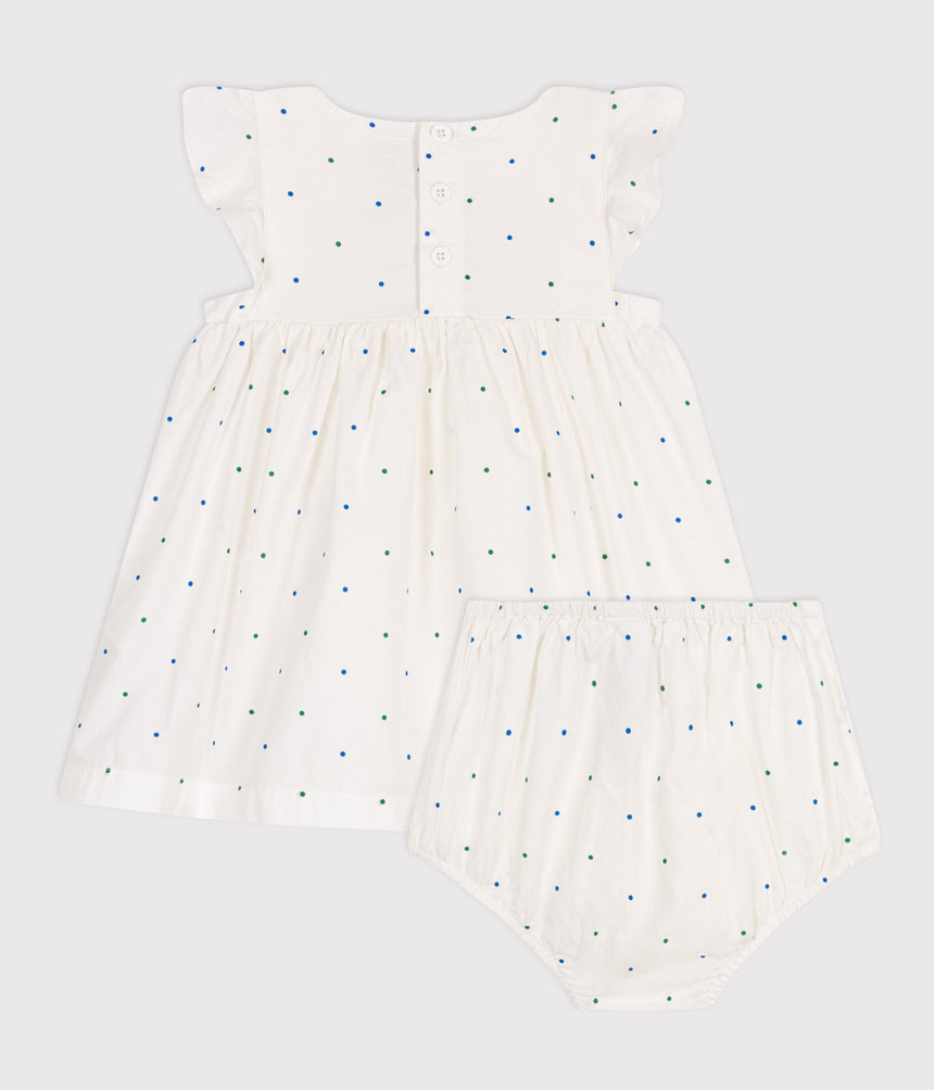 BABIES' WHITE COTTON DRESS AND BLOOMERS PRINTED WITH SPOTS