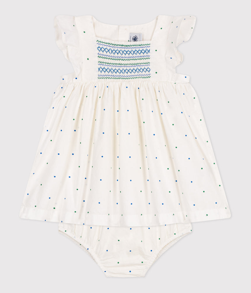 BABIES' WHITE COTTON DRESS AND BLOOMERS PRINTED WITH SPOTS