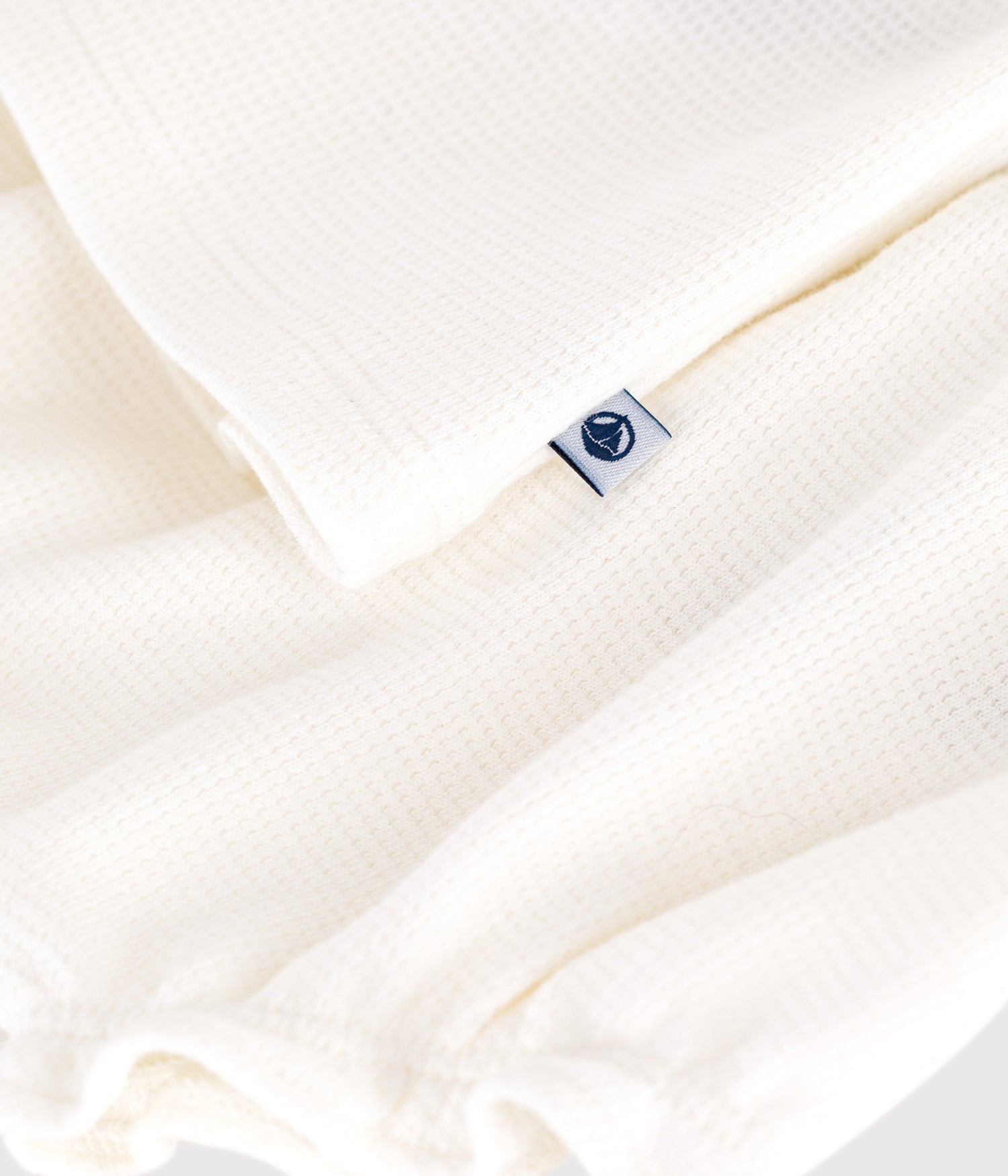 BABIES SHORT - SLEVEED WHITE HONEYCOMB DRESS AND BLOOMERS BABIES SHORT - SLEVEED WHITE HONEYCOMB DRESS AND BLOOMERS