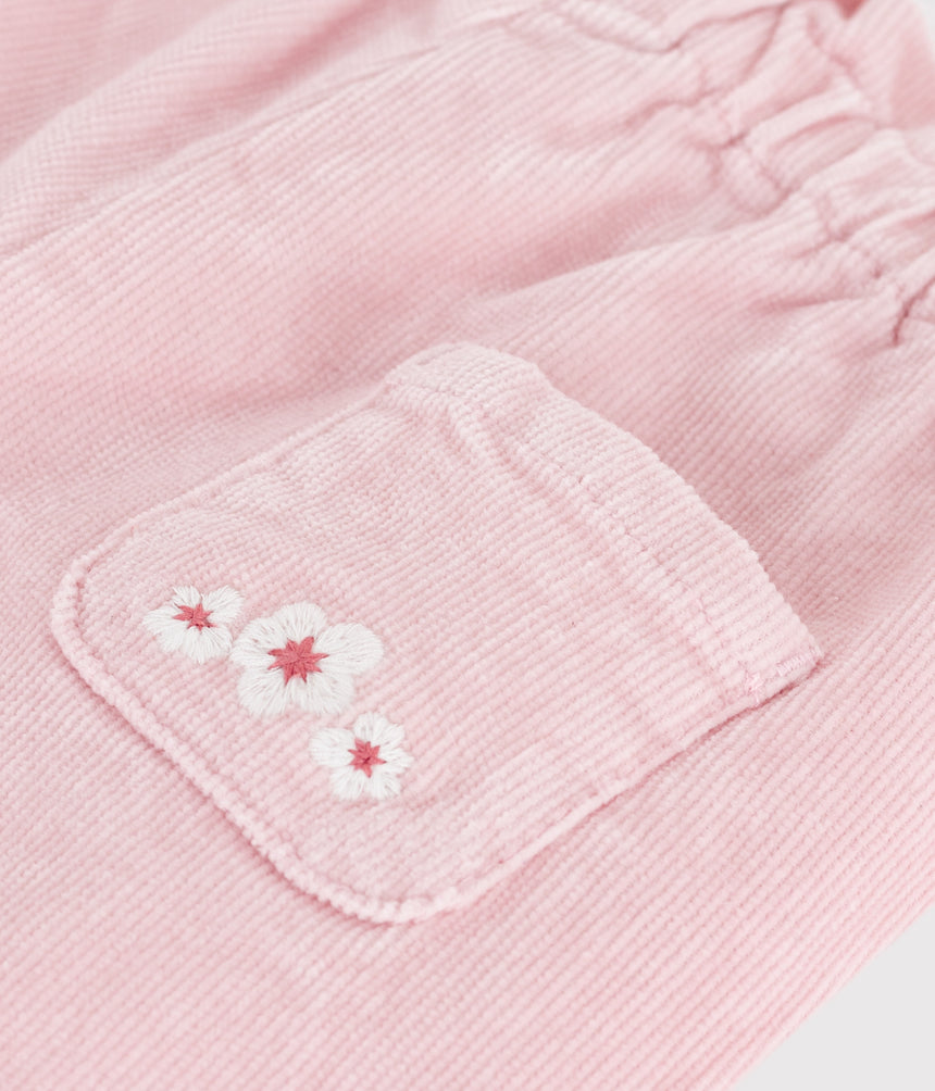 BABIES' PLAIN VELOUR TROUSERS WITH AN EMBROIDERED BACK POCKET
