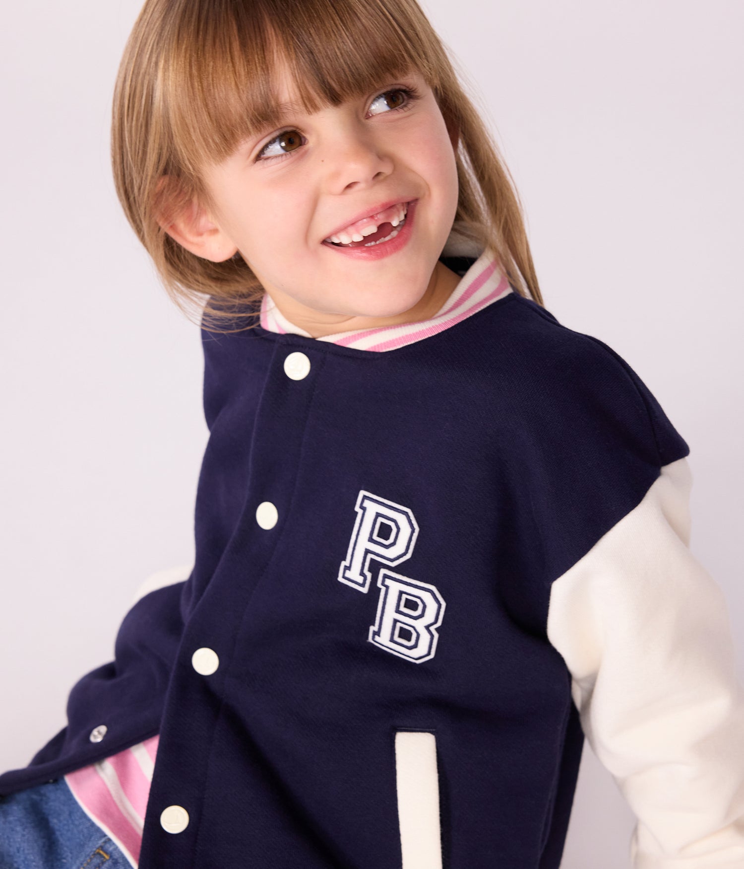 CHILDREN'S VARSITY-STYLE JACKET IN PLAIN COTTON CHILDREN'S VARSITY-STYLE JACKET IN PLAIN COTTON
