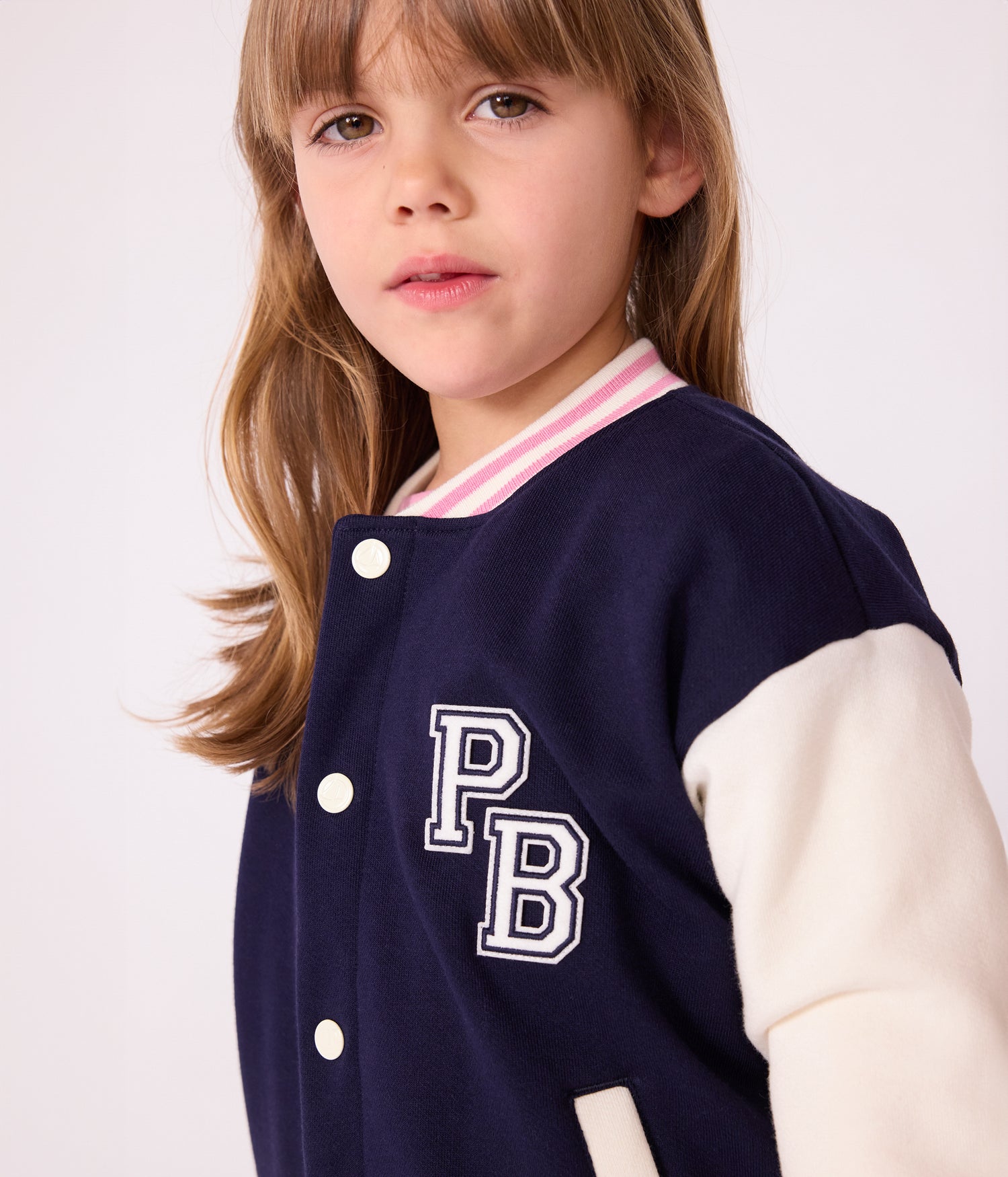 CHILDREN'S VARSITY-STYLE JACKET IN PLAIN COTTON CHILDREN'S VARSITY-STYLE JACKET IN PLAIN COTTON