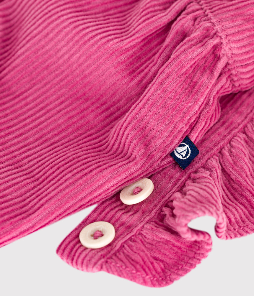 BABIES' DUNGAREES IN PLAIN CORDUROY WITH RUFFLES AND LONG LEGS