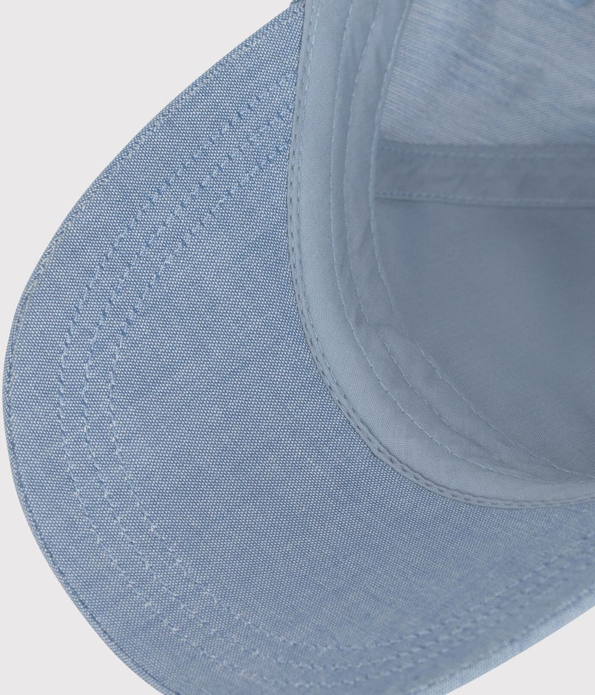 BABIES’ PETIT BATEAU CAP IN LIGHT-COLOURED DENIM