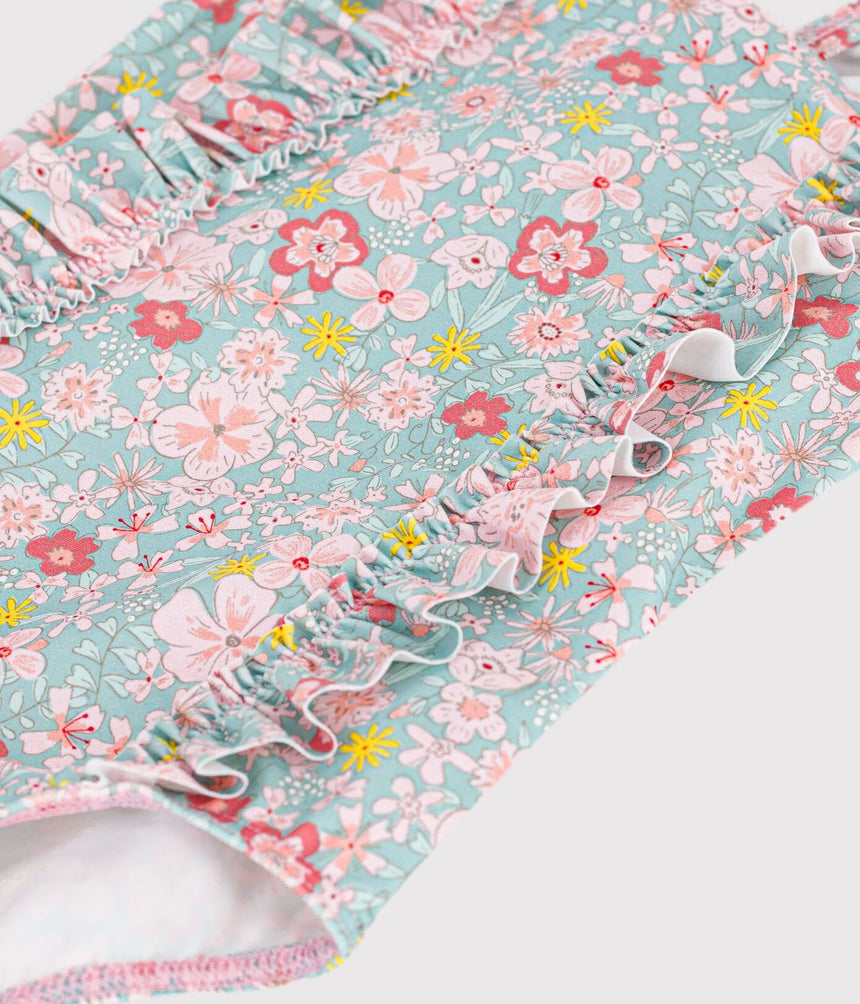 BABIES' ONE-PIECE SWIMSUIT WITH RUFFLES AND A FLOWER PRINT.
