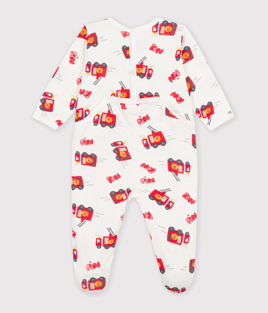 BABIES' PYJAMA SUIT IN TUBE KNIT FABRIC WITH A PRINTED FIREFIGHTER DESIGN AND A BACK OPENING
