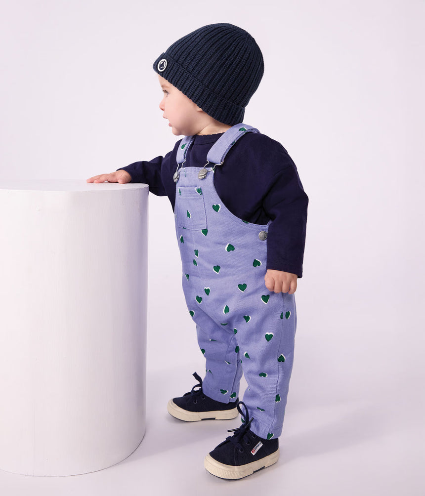 BABIES' DUNGAREES IN SERGE WITH LONG LEGS AND A HEART PRINT
