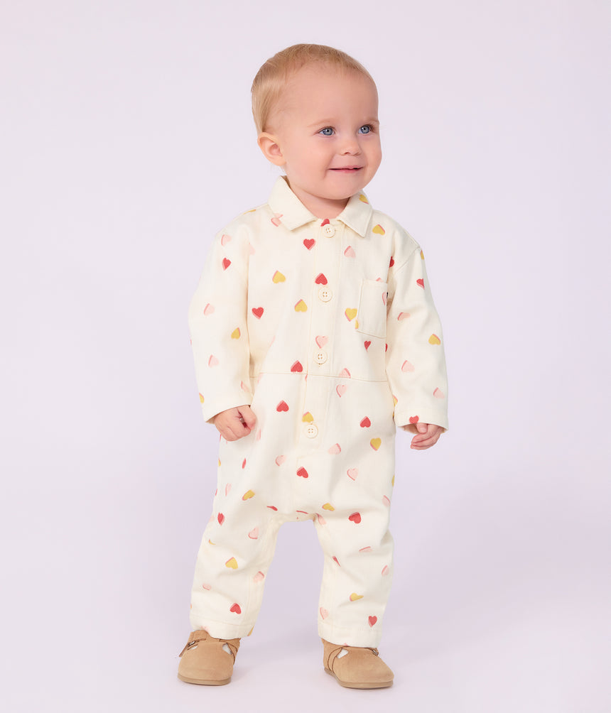 BABIES' LONG JUMPSUIT IN COTTON WITH A HEART PRINT
