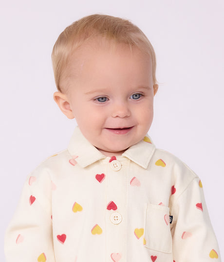BABIES' LONG JUMPSUIT IN COTTON WITH A HEART PRINT