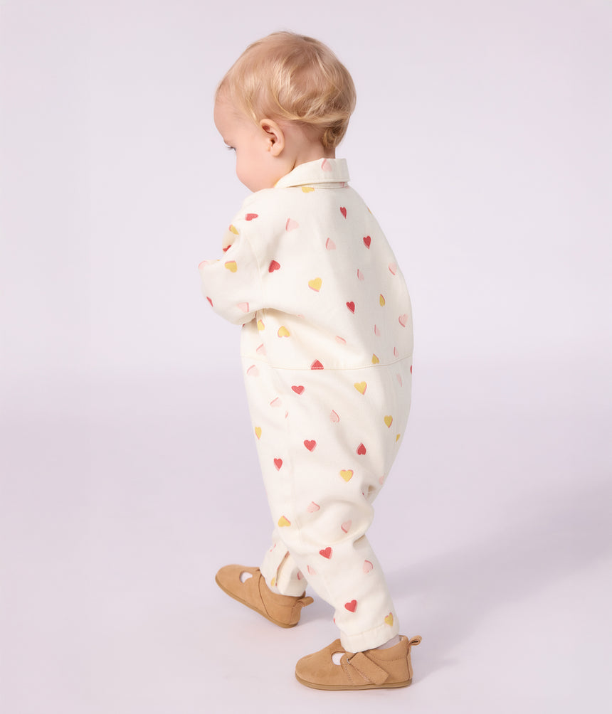 BABIES' LONG JUMPSUIT IN COTTON WITH A HEART PRINT