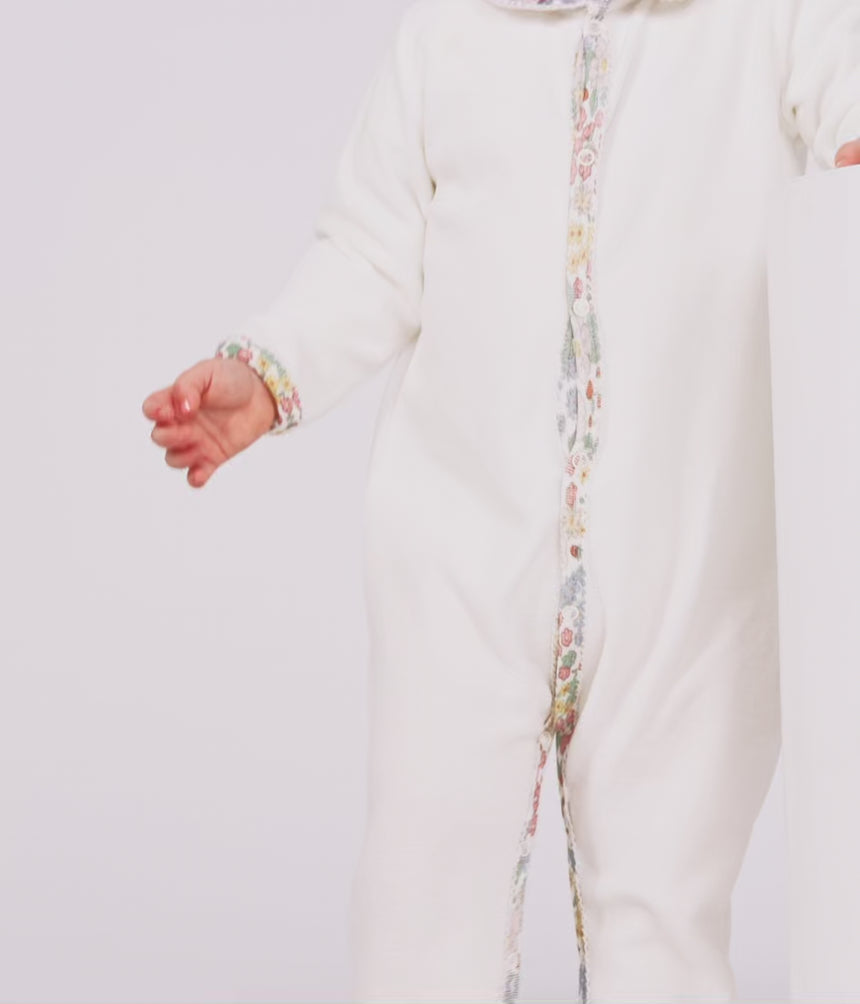 BABIES' PYJAMA SUIT IN PLAIN VELOUR WITH A COLLAR AND FLORAL PRINT DETAIL