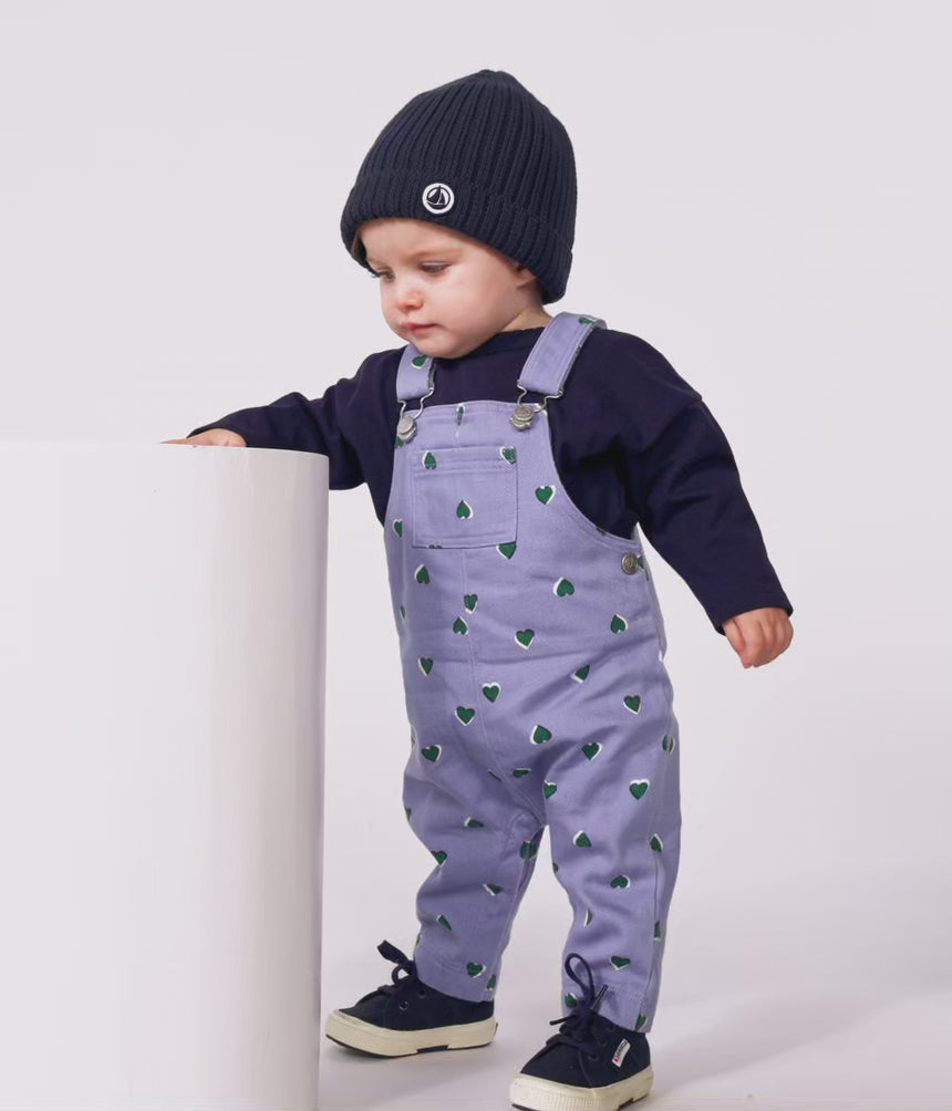 BABIES' DUNGAREES IN SERGE WITH LONG LEGS AND A HEART PRINT